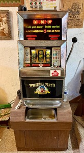 lot 142 image: Vintage WHISKEY PETES Casino Slot Machine