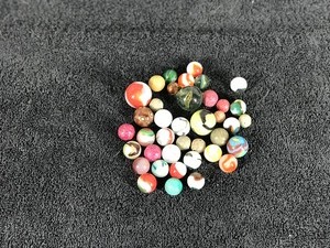 lot 263 image: Lot of Collectible Marbles and Some of the Glow Green when you put a black light on them