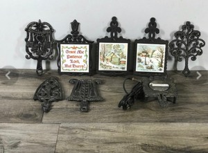 lot 300 image: Lot of Vintage Cast Iron Trivets and More
