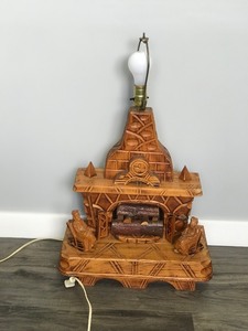 lot 308 image: Hand Carved Lamp - Older Couple in Rocking Chairs Sitting Next to the Fireplace
