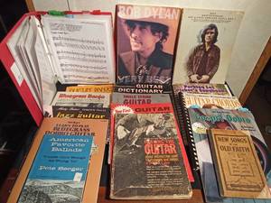 lot 32 image: 1925-2008 Sonmg books and banjo playing books including Bob Dylan and Kris kistopherson guitar playing song books