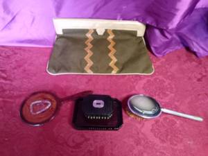 lot 59 image: Vintage Victorian horsehair brush, mirror bush and dish and vintage Timmy Weeds oversized clutch purse