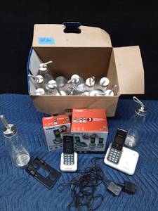 lot 80 image: Vintage V-tech handset cordless phones and new water bottles