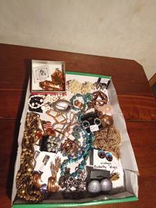 lot 40 image: Flat of jewelry including 24K dipped holly ornament, Sarah Coventry, Western Germany, Celebrity, Trifari and more