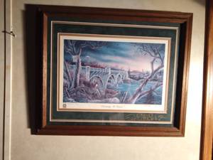 lot 91 image: Signed and numbered framed print of Brainerd MN series sponsored by Brainerd fire dept. Crossing at Dawn 137200 by J. D. Speltz