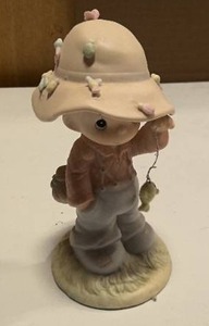 lot 8 image: Precious Moments My Love Will Never Let You Go model#103497