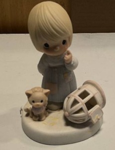 lot 12 image: Precious Moments The Lord Giveth and the lord taketh away item#100226