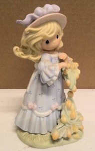 lot 23 image: Precious Moments The Beauty of God Blooms Forever item#129143