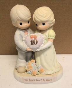 lot 34 image: Precious Moments Ten Years Heart to Heart item#163805