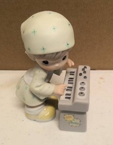 lot 46 image: Precious Moments Express Who You are and you be a star item#116611