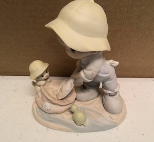 lot 100 image: Precious Moments Nothing can dampen the spirit of caring item#603864