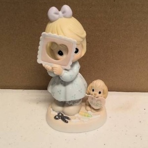 lot 108 image: Precious Moments Figurine you complete my heart item#681067