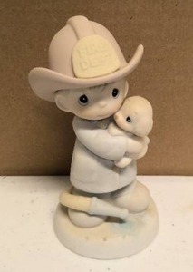 lot 111 image: Precious Moments Figurine Love Rescued Me Item#102393
