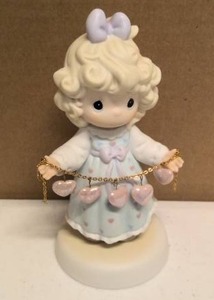 lot 115 image: Precious Moments Figurine You have touched so many hearts Item#261084