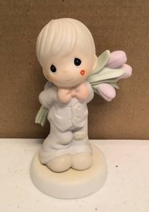 lot 123 image: Precious Moments Figurine for the sweetest tu-lips in town item#306959