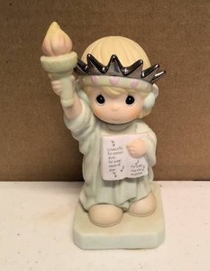 lot 145 image: Precious Moments Figurine America, Youre Beautiful item#528862R