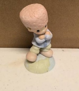 lot 149 image: Precious Moments Figurine Loves Russian into my heart item#456446