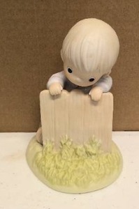 lot 151 image: Precious Moments Figurine it may be greener, but its just as hard to cut item#163899