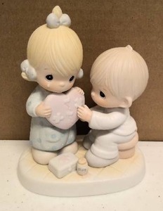 lot 152 image: Precious Moments Figurine Hes the healer of broken hearts item#100080