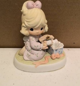lot 211 image: Precious Moments Figurine Celebrating his arrival item#878952
