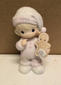 lot 230 image: Precious Moments Figurine  1993 annaul eddition collectible