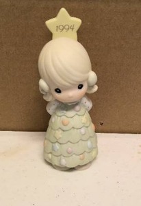 lot 231 image: Precious Moments Figurine  1994 annaul eddition collectible