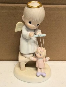 lot 252 image: Precious Moments Figurine the good lord will always uphold us Item#325325