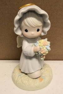lot 260 image: Precious Moments Figurine a bouquet from gods garden of love item#184268
