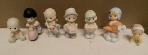 lot 292 image: Precious Moments Figurine set of 7 Item#15792, 529435, 12416R, 634778, 529494, 634999, and 184071