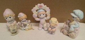 lot 304 image: Precious Moments Figurine Vintage Clown Set  Item#B0007 All aboard for Birthday Club Fun, Item#B0011, Item#456020, item#163708, and Item#B0012