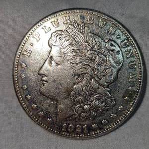 lot 59 image: 1921 S Morgan Dollar, AU withToning