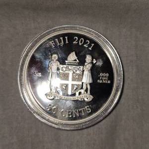 lot 81 image: 2021 50c 1oz Cats Silver Round