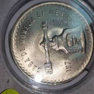 lot 87 image: 1979 1 onza Mexican Silver Rounds