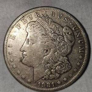 lot 40 image: 1921 S Morgan Dollar, Fine Plus with Gold Toning