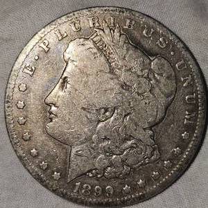 lot 46 image: 1899 O Morgan Dollar $1