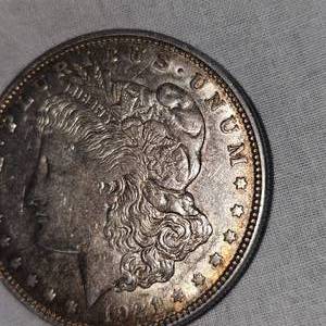 lot 54 image: 1921 Morgan Dollar $1 VF Plus with Gold Toning