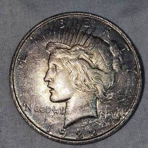 lot 21 image: 1922 Peace Dollar $1 VF w DarkToning