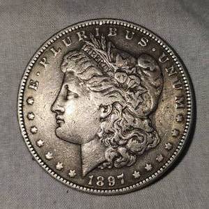 lot 17 image: 1897 Morgan Dollar $1 Beautiful Age Toning