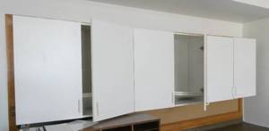 lot 43 image: Rm 204 - 3 cabinets 13 deep 30 tall 9 ft wide