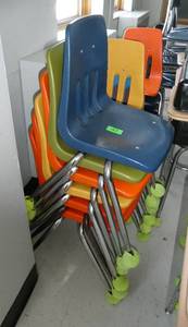 lot 47 image: Rm 204 - 20 colored plastic chairs by MIRCO