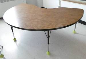 lot 49 image: Rm 204 -  Half moon table 71x48 with chair