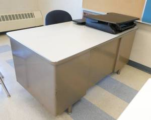 lot 156 image: Rm 215 - steel desk and chair, monitor riser, floor mat, crayon picture
