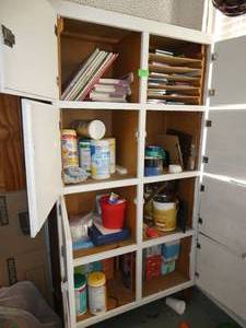 lot 242 image: GymO- Wood Cabinet and contents