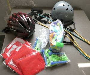 lot 251 image: GymO- Two bicycle helmets, jump ropes