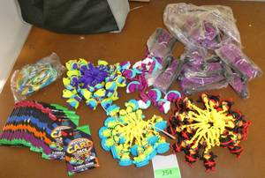 lot 254 image: GymO- Lot of approx 80 Backpack friends, trading cards, new jump ropes, bracelets