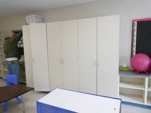 lot 318W image: Rm 114 - Wall of cabinetry - 3 cabinets, 2 bookcases and shoe storage