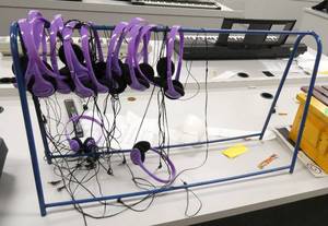 lot 343 image: Rm 114B - stand full of headphones