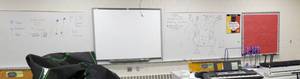 lot 344 image: Rm 114B - front of room, entire wall of whitechalk boards - NOT the Smartboard