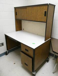lot 353 image: Rm 111B - Next room full - steel desk covered with wallpaper, table, stool, file cabinet