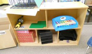 lot 397 image: Rm 101A - shelves and contents and a chair